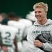 Four-star quarterback Brogan Roback smiles on the field after the EMU spring practice on Sunday, April 14. AnnArbor.com I Daniel Brenner
